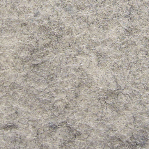 Real photograph of a fibrous felt surface. Source describes a wool-and-rayon blend; percentages, bonding route, mass and performance cannot be established from the image. Not a JKPD product; unmodified.