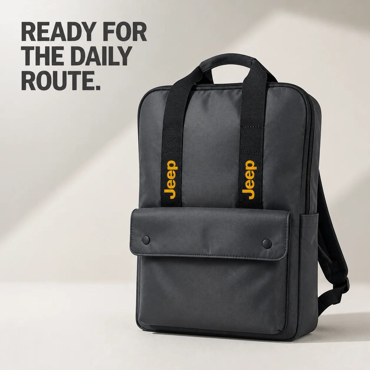 Black business backpack with top handles and a front flap pocket from the JKPD catalog.